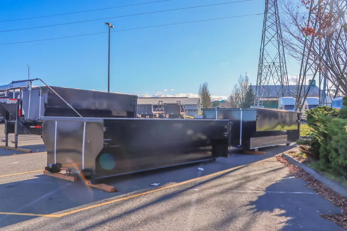 Roll-off dumpster ready for waste disposal at job site for 2 Yard Dumpster Rental in Billings